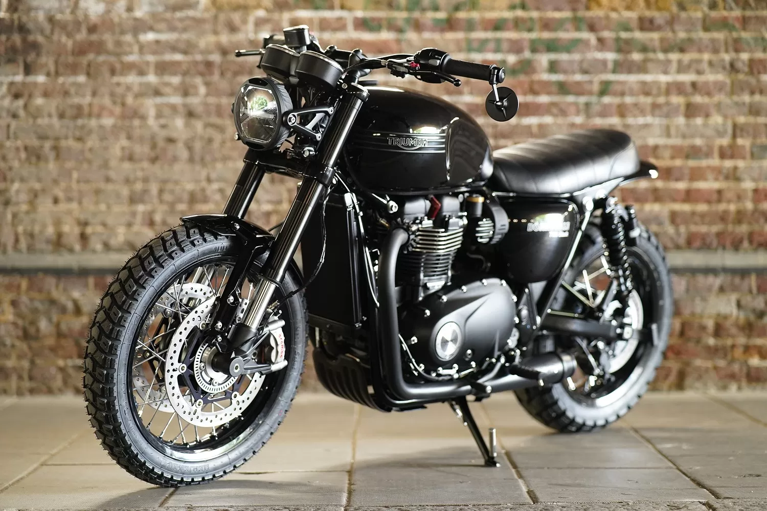Charlie Stockwell Raven T120 custom Triumph. Dark, stripped-down Bonneville with Brembo brakes and Zard 2-2 exhaust system.