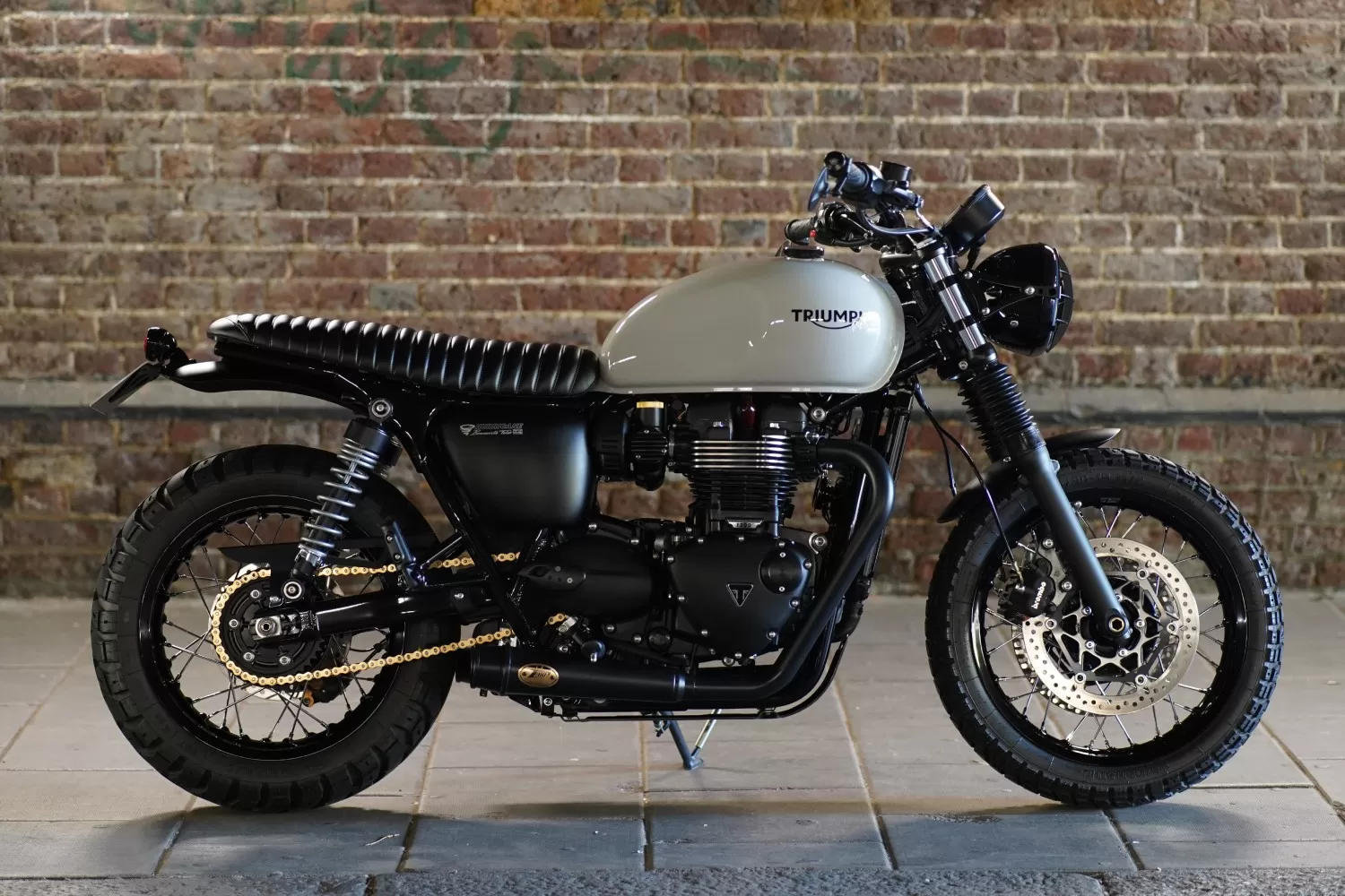Charlie Stockwell Rifles Rocket 3GT custom Triumph. Heritage tribute motorcycle combining power, pride, and military-inspired styling.