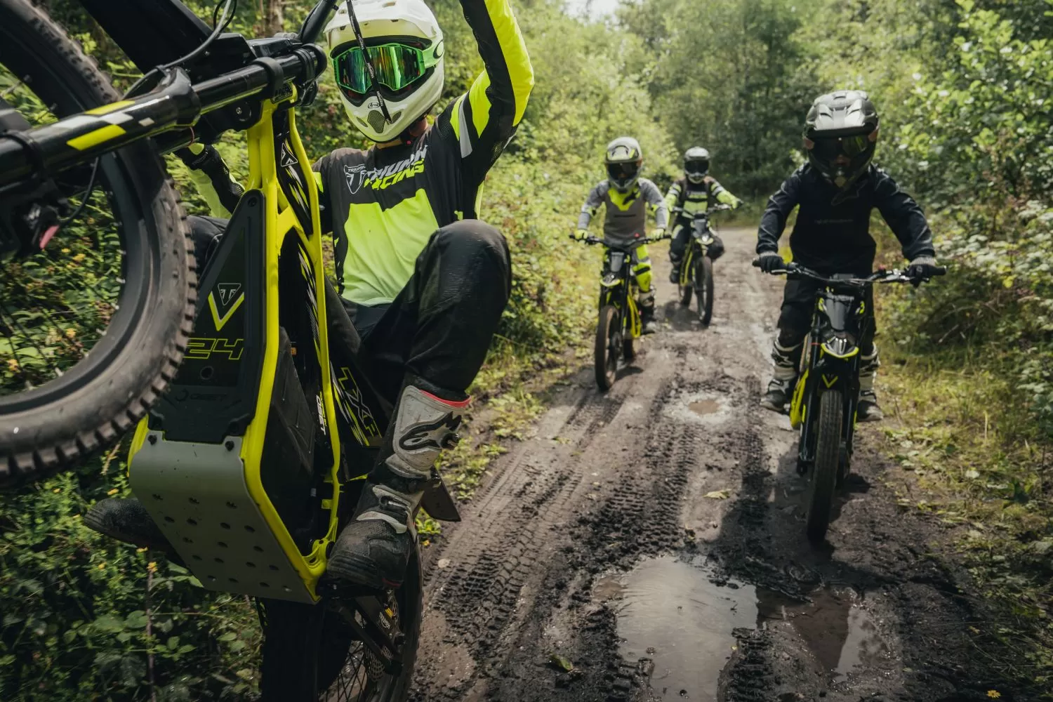 The new Triumph TXP electric bike range riding through the woods