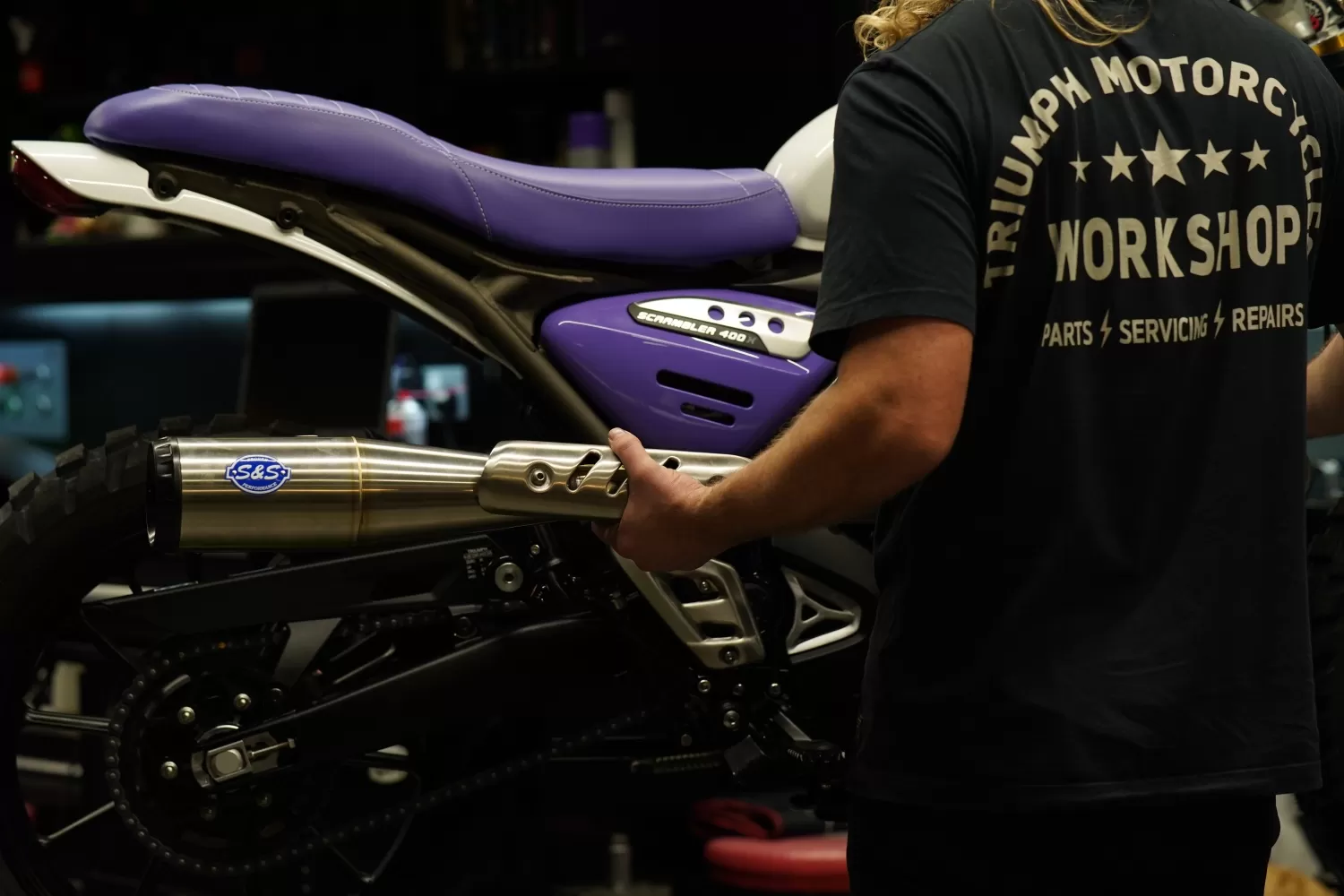 Charlie fitting the S&S Grand National Slip-On to the Baja 400 X Custom