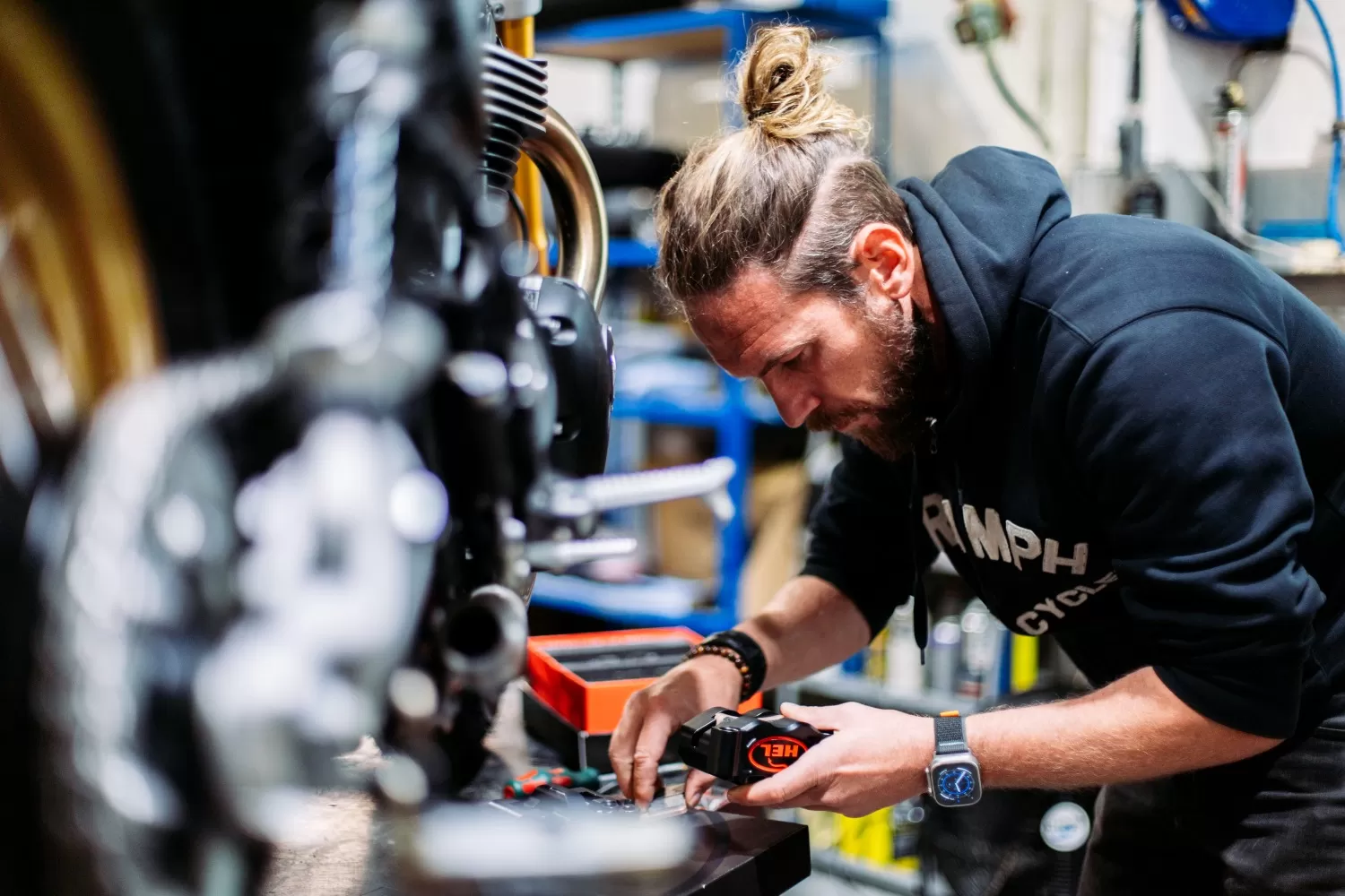 Charlie Stockwell working on a custom Triumph Speed Twin Charlie Stockwell working on a custom Triumph Speed Twin