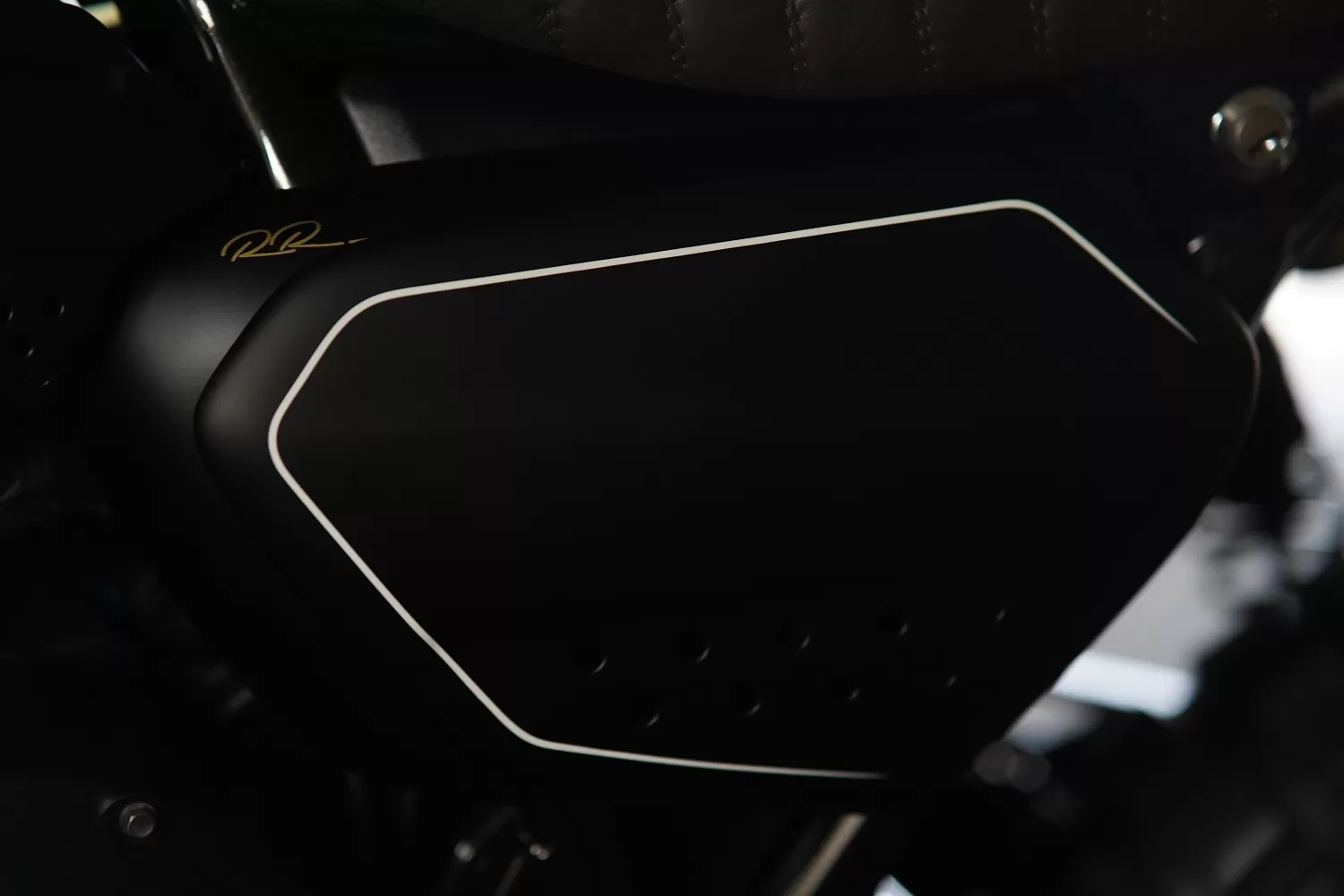 Close up of side panel on a custom Triumph Scrambler 1200 by Stockwell Design